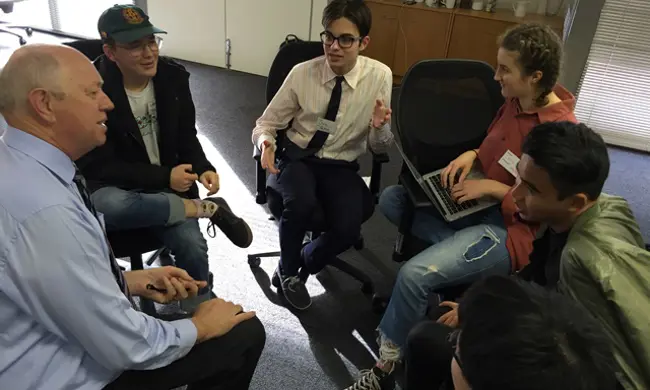 Video Group Discussing Ideas With The Commissioner